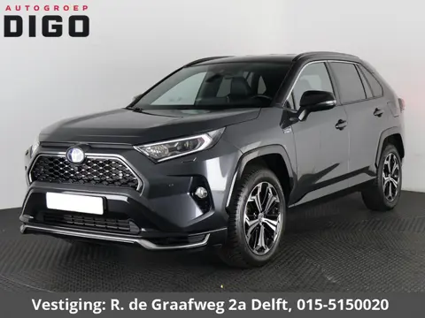 Toyota RAV4 2.5 Plug-in Hybrid AWD Bi-Tone Plus | 1500 KG trekgewicht | JBL Audio | Stoelverwarming 