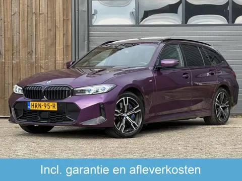 BMW 3 Serie Touring 330e xDrive | 2 jaar garantie + onderhoud | Full option |