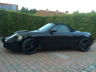 Porsche boxster 2500cc, 1997, 228800km, zwart metalic, zwarte 18" cup velgen, witte lichten