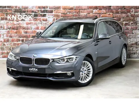 BMW 3-serie Touring 320i High Executive Luxury Line Automaat / Navigatie Professional / Panoramadak 