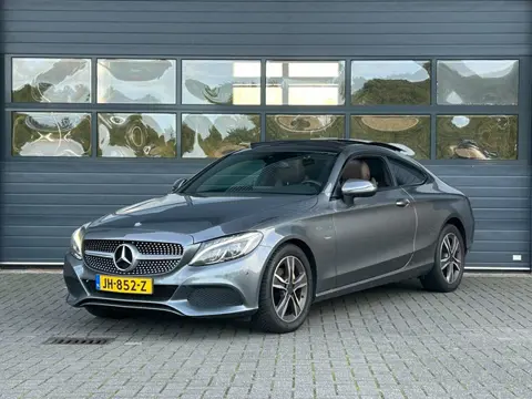 MERCEDES-BENZ C-KLASSE COUPÉ 180 EDITION ONE I AUTOMAAT I SCHUIF/KANTELDAK I LEDEREN BEKLEDING I STO