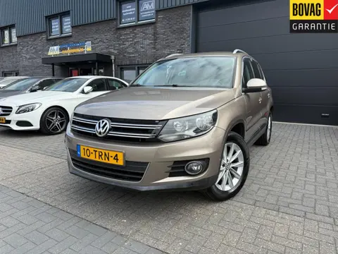 Volkswagen Tiguan 1.4 TSI Sport&Style | 1E EIGENAAR | 3/6/12MND GARANTIE | NAVI | PDC | 160 PK | LAG