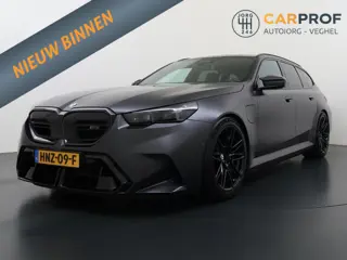 BMW 5-serie Touring M5 NL Auto | BTW | Akrapovic | BMW onderhoudscontract | Pano | Trekhaak | M Driv