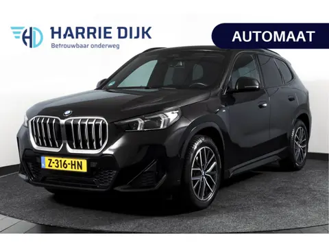 BMW X1 sDrive18i 136 PK | M-Sport | Afn. Trekhaak | Dig. Cockpit | Cruise | PDC | Camera | NAV + App