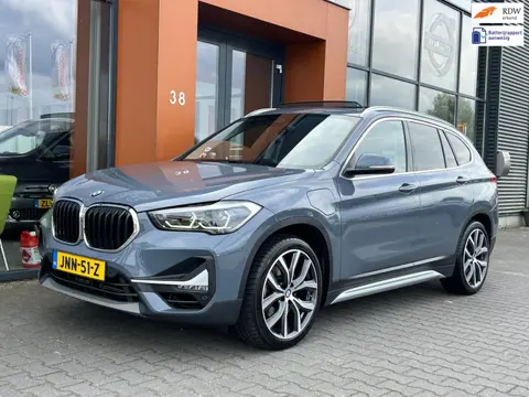 BMW X1 XDrive25e eDrive|Pano|Trekhaak|Sfeerverl.|HUD|Memory