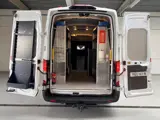 Foto 30 van Ford Transit 350 2.0 TDCI 130PK euro6 L3H3 Trend MHEV RWD Sortimo Inrichting Victron v230 Standkache