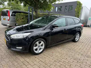 Foto 13 van Ford Focus Wagon 1.0 EcoBoost Titanium Business 1e eigenaar, 67.520 km, cruise, clima, stoel en stuu
