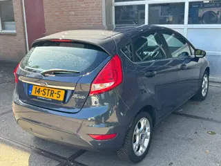 Foto 12 van Ford Fiesta 1.25 Titanium,Climat,Cruise,LMV,5 Drs