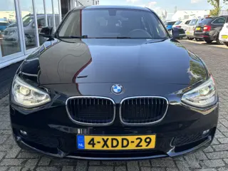 Foto 13 van BMW 1-serie 114i EDE | Stoelverwarming | Leder | Bluetooth | Navi | Cruise