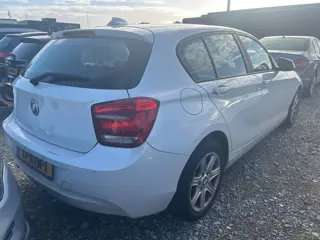 Foto 19 van BMW 1-serie 116i Business | 2012 | Benzine | Handgeschakeld | SCHADE AUTO |