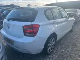 Foto 29 van BMW 1-serie 116i Business | 2012 | Benzine | Handgeschakeld | SCHADE AUTO |