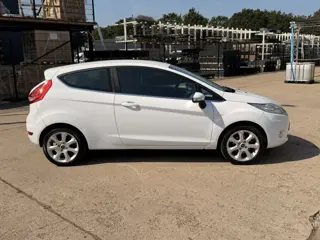 Foto 12 van Ford Fiesta 1.25 Sensation Edition, AIRCO(CLIMA), CRUISE CONTROL, PARKEERSENSOREN, BLUETOOTH-RADIO-C
