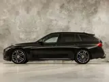 Foto 29 van BMW 3 Serie 320i M Sport 184Pk Automaat (VIRTUAL COCKPIT, M PAKKET, GROOT NAVI, STOELVERWARMING, SPO