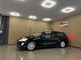 Foto 22 van Ford Focus Wagon 1.0 EcoBoost Titanium Business * Automaat / Carplay / Navigatie / LM Velgen / NL Au