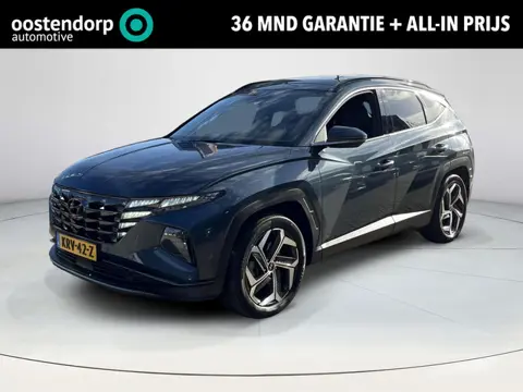 Hyundai Tucson 1.6 T-GDI PHEV Premium Sky 4WD | Schuif-/kanteldak | Stoelverwarming V+A | Stuurverwa