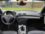 Foto 23 van BMW 1-serie 116i 2.0 122PK Airco Sportvelgen Nieuwe Ketting