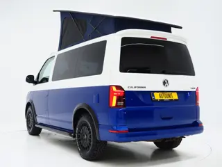 Foto 16 van Volkswagen California 2.0 TDI T6.1 4Motion DSG All Terrain | Slaaphefdak | Draaistoelen | Koelkast |