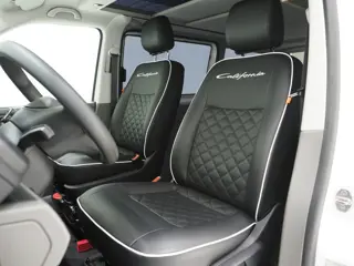 Foto 18 van Volkswagen California 2.0 TDI T6.1 4Motion DSG All Terrain | Slaaphefdak | Draaistoelen | Koelkast |