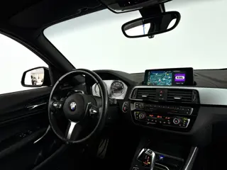 Foto 20 van BMW 1-serie 118i Corporate Lease High Executive | Panoramadak | Park assist | Harman Kardon | Stoelv