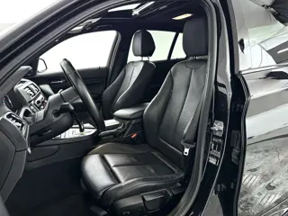 Foto 17 van BMW 1-serie 118i Corporate Lease High Executive | Panoramadak | Park assist | Harman Kardon | Stoelv