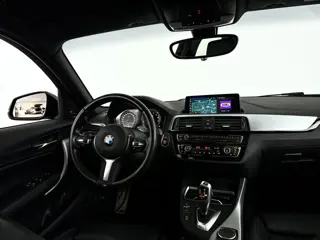 Foto 16 van BMW 1-serie 118i Corporate Lease High Executive | Panoramadak | Park assist | Harman Kardon | Stoelv