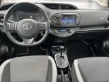 Foto 21 van Toyota Yaris 1.5 Hybrid Y20 Gold Edition | Fietsendragerbeugel | Keyless entry | Bluetooth | Licht m