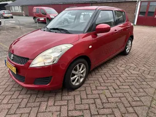 Foto 13 van Suzuki Swift 1.2 Comfort EASSS AIRCO EL RAM NAP DEALER OH