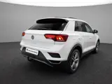 Foto 26 van Volkswagen T-Roc 1.5 TSI 150pk DSG Sport · Camera · Trekhaak · Navigatie · Stoelverwarming · 18'' In