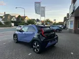 Foto 27 van Toyota Aygo X Hybrid 115 pulse stoelverwarming / keyless start / parkeersensoren voor + achter / Nav