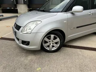 Foto 13 van Suzuki Swift 1.5 Exclusive, Automaat, Airco
