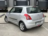 Foto 21 van Suzuki Swift 1.5 Exclusive, Automaat, Airco