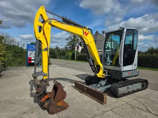 WACKER NEUSON EZ36 met kantelbak en dieplepel (bj 2019)