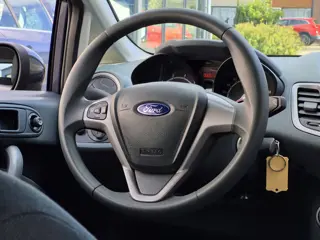 Foto 15 van Ford Fiesta 1.25 Limited|2e eig|NAP|Airco|El.Ramen|APK|AUX