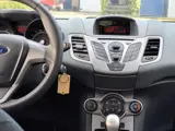 Foto 22 van Ford Fiesta 1.25 Limited|2e eig|NAP|Airco|El.Ramen|APK|AUX