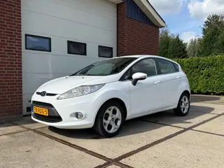 Foto 14 van Ford Fiesta 1.25 Titanium 1e Eigen PDC Cruise Contr Climate Contr