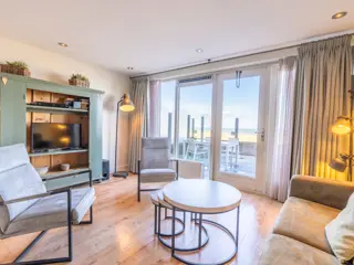 Appartement direct aan het strand met terras en zeezicht