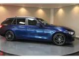 Foto 28 van BMW 3-serie Touring 318i Executive *Automaat* 2de Eigenaar|Dealer OH|Trekhaak|Cruise|Navi|PDC|18''Ve