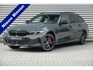 Foto 11 van BMW 3 Serie Touring 330e M-Sport Pro | Panodak | Trekhaak | H&K | HUD | Carbon | Memory | ACC |