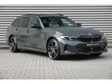 Foto 29 van BMW 3 Serie Touring 330e M-Sport Pro | Panodak | Trekhaak | H&K | HUD | Carbon | Memory | ACC |
