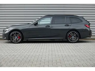 Foto 17 van BMW 3 Serie Touring 330e M-Sport Pro | Panodak | Trekhaak | H&K | HUD | Carbon | Memory | ACC |