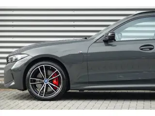Foto 13 van BMW 3 Serie Touring 330e M-Sport Pro | Panodak | Trekhaak | H&K | HUD | Carbon | Memory | ACC |
