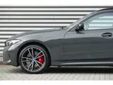 Foto 23 van BMW 3 Serie Touring 330e M-Sport Pro | Panodak | Trekhaak | H&K | HUD | Carbon | Memory | ACC |