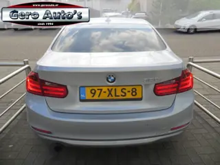 Foto 16 van BMW 3-serie 320i Executive sedan nl-auto 19 inch lmv nette auto !
