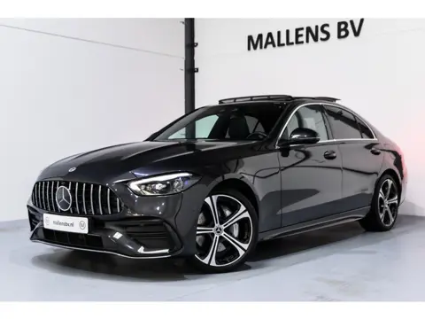 Mercedes-Benz C-klasse 400 e 4MATIC AMG Line ETREKHAAK/PANO/19INCHBREEDSET/AMG/LEDER