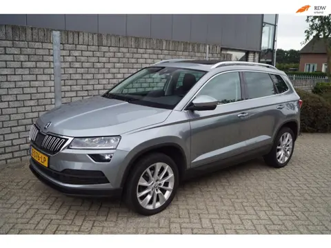 Skoda Karoq 1.5 TSI ACT Style Business Autom Panodak Leder/Alcantara Navi Camera Clima Adaptieve Cru