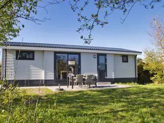 Comfortabel familiechalet met zonnige tuin aan de rand van het bos