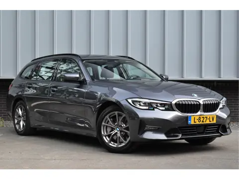 BMW 3 Serie Touring 330i High Executive Aut. | Sfeerverl | Stoelverwarming | Navi | Deal. OH