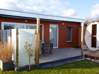 Vakantiehuis met eigen sauna en grote afsluitbare tuin bij dennenbos