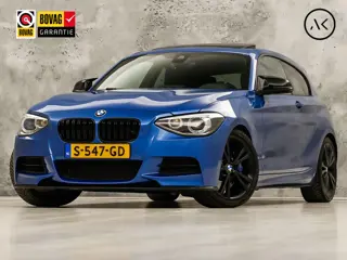 BMW M135 M135i xDrive High Executive Automaat 320Pk (GROOT NAVI, SCHUIFDAK, ALCANTARA STUUR, AKRAPOV