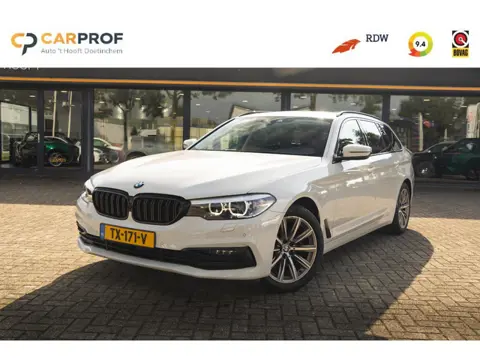 BMW 5-serie Touring 520i High Executive Stoel- & Stuurverwarming | Trekhaak | LED | Dealeronderhoude